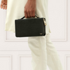 Designer wallet being carried
