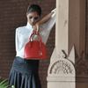 Yarra Medium Red Bag in hand